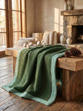 Creative Home's Green waffle and muslin organic cotton blanket layered on wooden bench, breathable 8-layer reversible luxury throw blanket,BB-DesH-WaMusBlnkt-Grn-6070,BB-DesH-WaMusBlnkt-Grn-Tw,BB-DesH-WaMusBlnkt-Grn-Q,BB-DesH-WaMusBlnkt-Grn-K,BB-DesH-WaMusBlnkt-Grn-100118,BB-DesH-WaMusBlnkt-Grn-100125