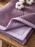 Creative Home's Purple waffle and Damson muslin organic cotton blanket styled on sofa, soft breathable 8-layer reversible throw blanket, breathable reversible luxury bedspread, reversible 8-layer textured luxury throw,BB-DesH-WaMusBlnkt-Dmsn-6070,BB-DesH-WaMusBlnkt-Dmsn-Tw,BB-DesH-WaMusBlnkt-Dmsn-Q,BB-DesH-WaMusBlnkt-Dmsn-K,BB-DesH-WaMusBlnkt-Dmsn-100118,BB-DesH-WaMusBlnkt-Dmsn-100125