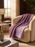 Creative Home's Purple waffle and Damson muslin organic cotton blanket styled on sofa, soft breathable 8-layer reversible throw blanket, breathable reversible luxury bedspread, reversible 8-layer textured luxury throw,BB-DesH-WaMusBlnkt-Dmsn-6070,BB-DesH-WaMusBlnkt-Dmsn-Tw,BB-DesH-WaMusBlnkt-Dmsn-Q,BB-DesH-WaMusBlnkt-Dmsn-K,BB-DesH-WaMusBlnkt-Dmsn-100118,BB-DesH-WaMusBlnkt-Dmsn-100125